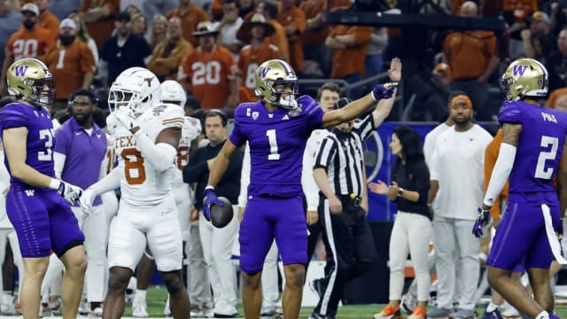Washington Huskies wide receiver Rome Odunze (1) reacts after a play against the Texas Longhorns during the second quarter of the 2024 Sugar Bowl college football playoff semifinal game at Caesars Superdome. 
